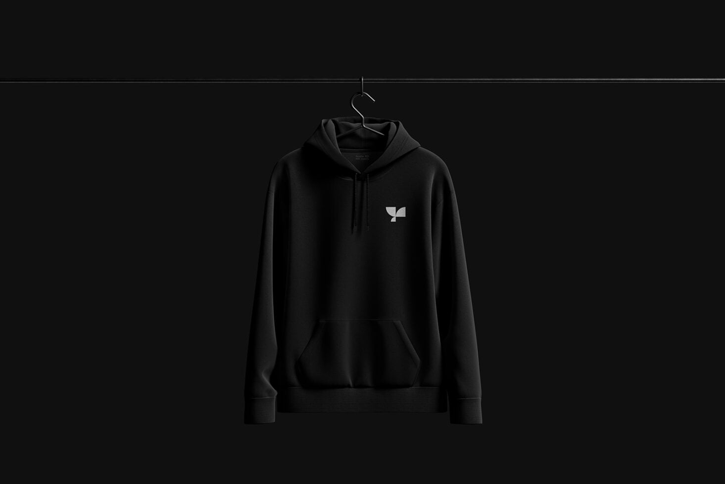 Premium heavyweight black hoodie with minimal embroidered logo